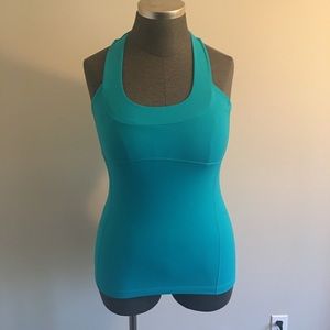 Size 12 blue raiser back tank w build in bra.